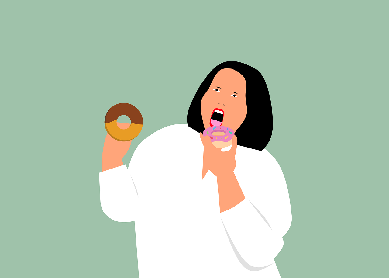 woman eating donut who wants to lose weight but also eat intuitively.